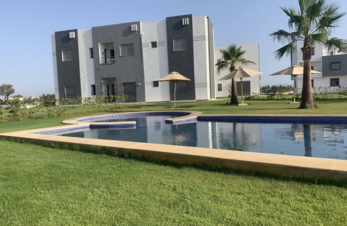 Bouficha Apartment | Superb modern app., richly furnished, pool view, lawned mountain garden