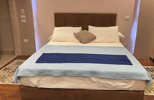 Heliopolis Apartment | The Cairo International Airport, 5 km from A Family Friendly Apartment.
