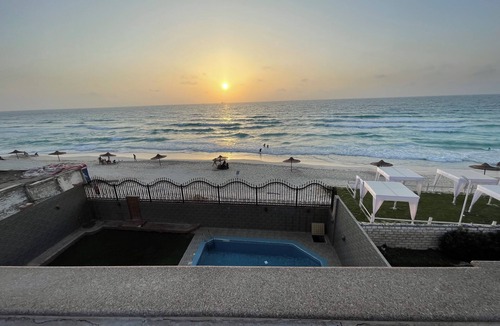 Al-'Amriyah Villa | The red villa is the first north coast road, 15 minutes from the airport.