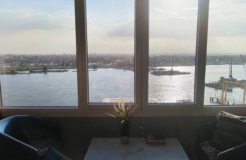 Maadi Apartment | The Traveler Nile and Pyramid View Magical Sunrises, Historic Wonders