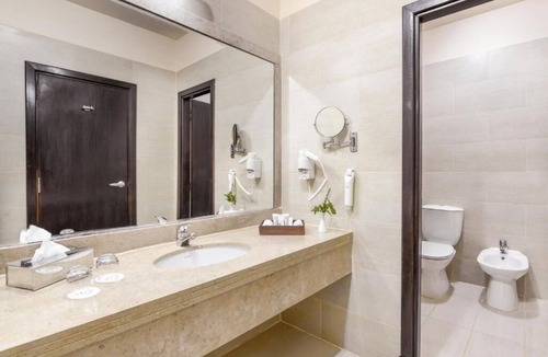 Village Road Resort | Your Private Pool View Junior Suite with Living Space Near Diving Spots