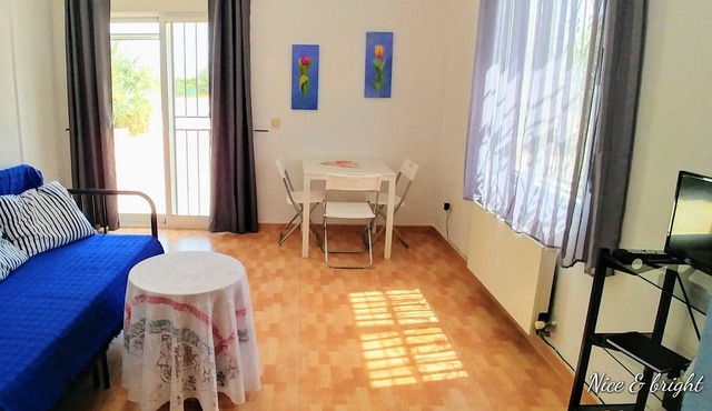 Bright studio apartment with secure parking and share of owners' pool in Sax