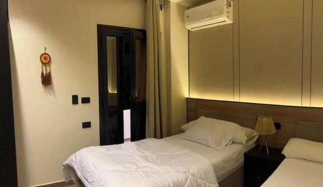 Cozy 1-bedroom apartment in charming Giza Governorate with AC