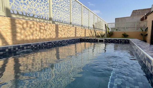 Guest room with 2 single beds, pool access. in Marrakech