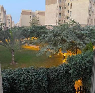 Luxurious, fully furnished and well equipped apartment with modern amenities, stunning views, and convenient location for remote work or studying from home in Madinaty