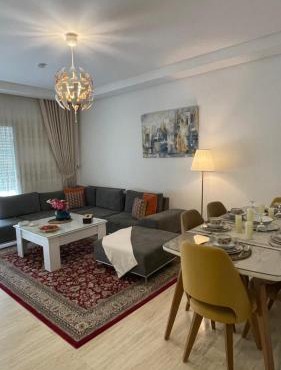 Luxury 127m Apartment in Jardins de Carthage with Balcony, Private Parking & Prime Location