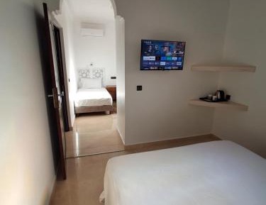 Quadruple Room with Private Bathroom