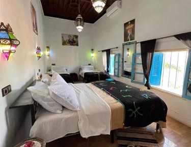 Quadruple Room with Private Bathroom