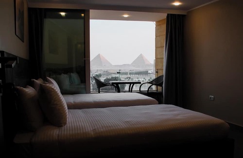Oula Bed & Breakfast | Asia Pyramids View