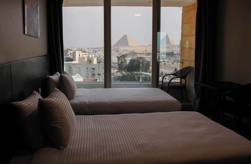 Oula Bed & Breakfast | Asia Pyramids View